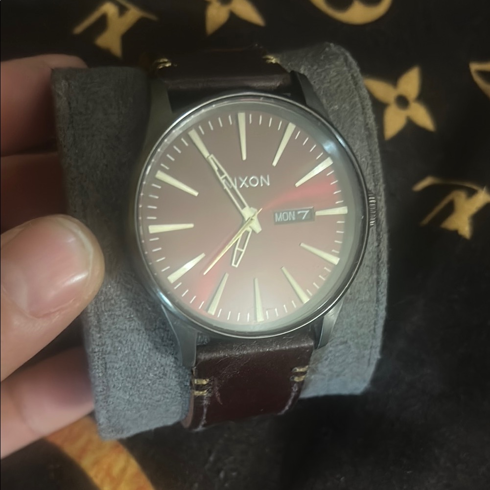 Nixon Silver Case Watch With Dark Brown Leather Strap Nixon Silver Case Watch With Dark Brown Leather Strap